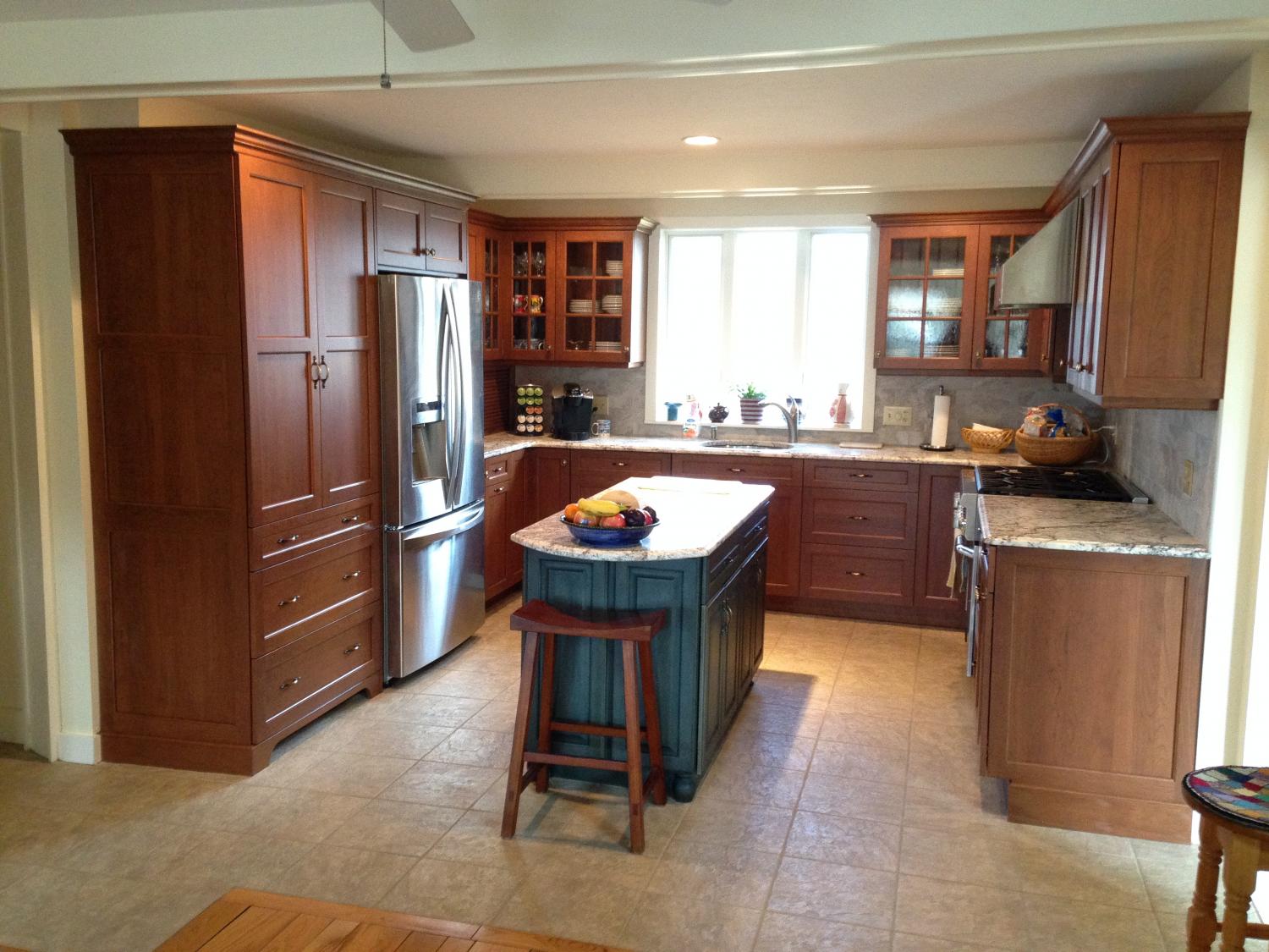 We replaced the tile floor and kitchen cabinets (cabinets furnished by Bottello Lumber)